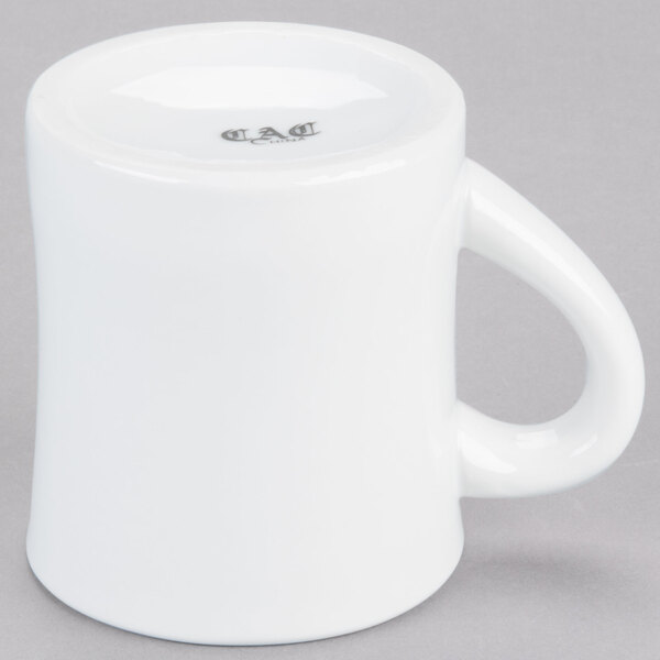 A CAC Hartford porcelain mug with a handle.