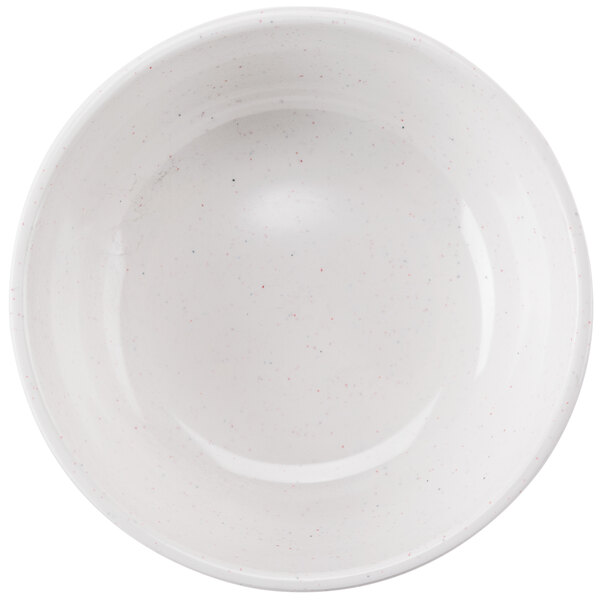 A white bowl with blue speckled spots.