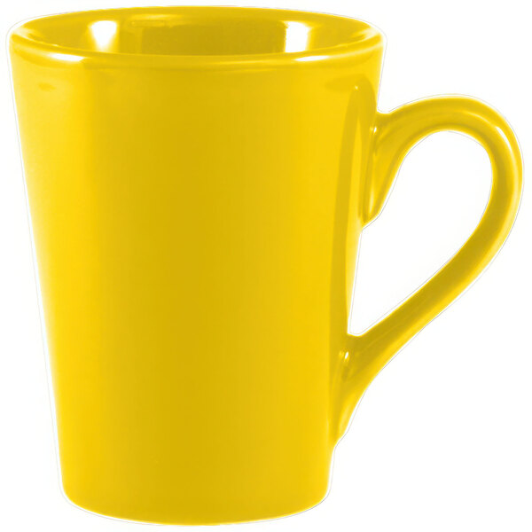 A yellow Venice Victory mug with a handle.