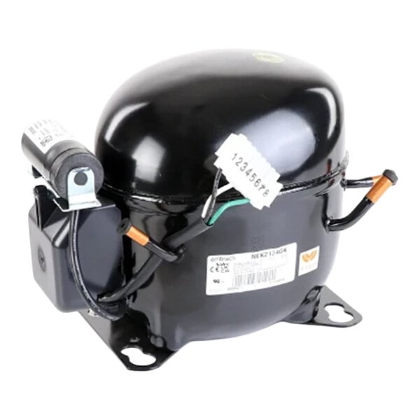 A black, dome-shaped mechanical component with attached wires, a capacitor, and mounting brackets, likely a refrigeration compressor.