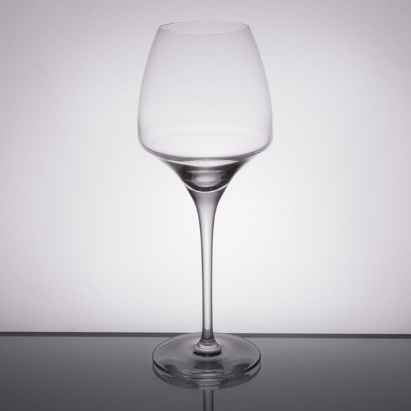 A Chef & Sommelier Universal wine glass on a table.