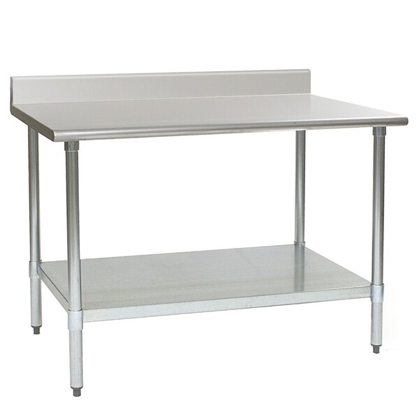 A metal work table with a shelf.