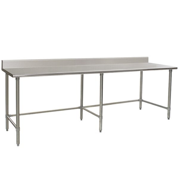 A long stainless steel Eagle Group work table with a metal base.