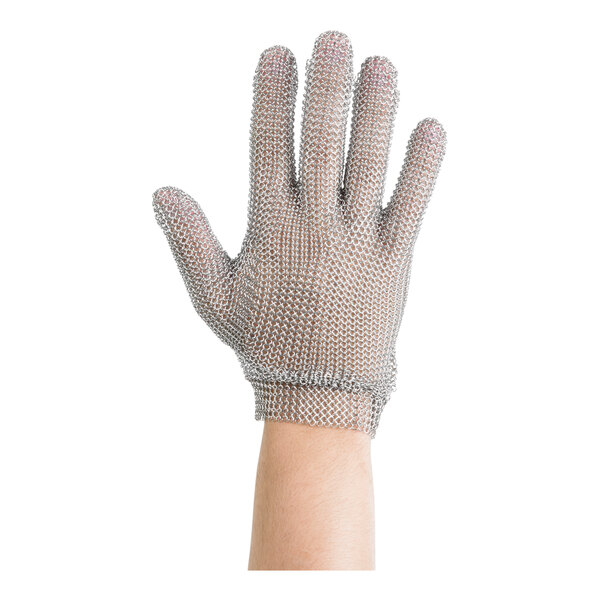 A person wearing a Victorinox stainless steel mesh glove on their hand.