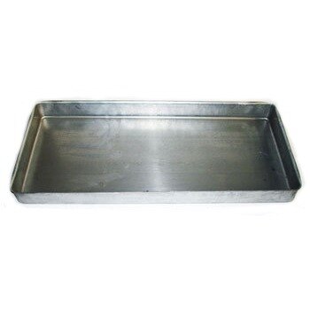 A True metal drain pan with a hole in the bottom.