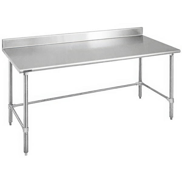A stainless steel Eagle Group open base work table with a backsplash on metal legs.