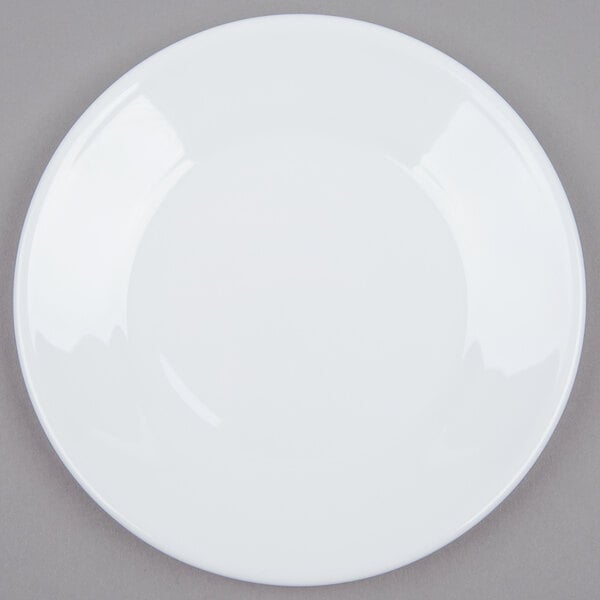 A white Arcoroc bread and butter plate with a white rim.