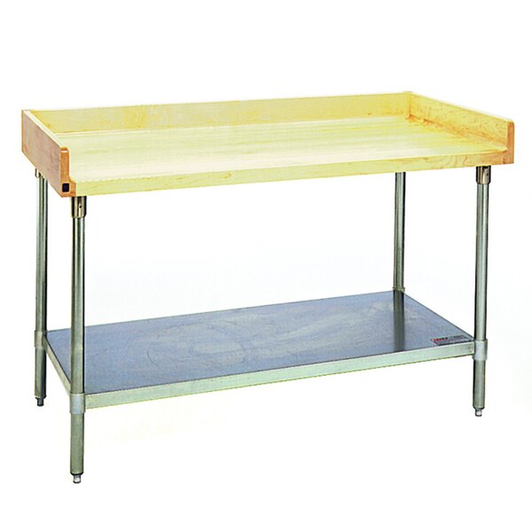 A wood top work table with a stainless steel undershelf.