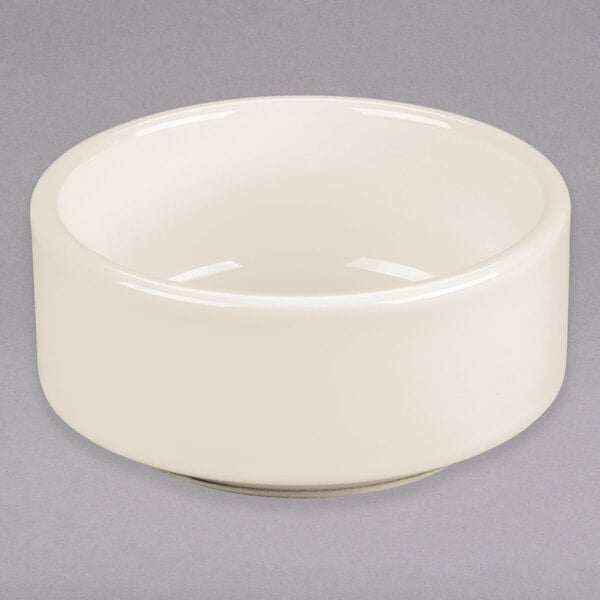 A stackable white Tuxton china bowl.