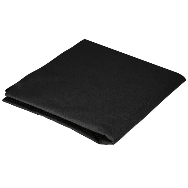 A black folded table cover on a white background.
