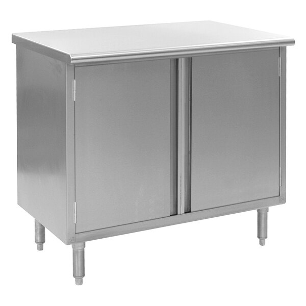 A stainless steel cabinet with two doors under a white surface.