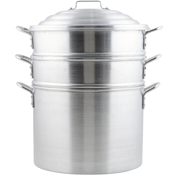 A silver aluminum Town Clam Steamer pot with three lids.