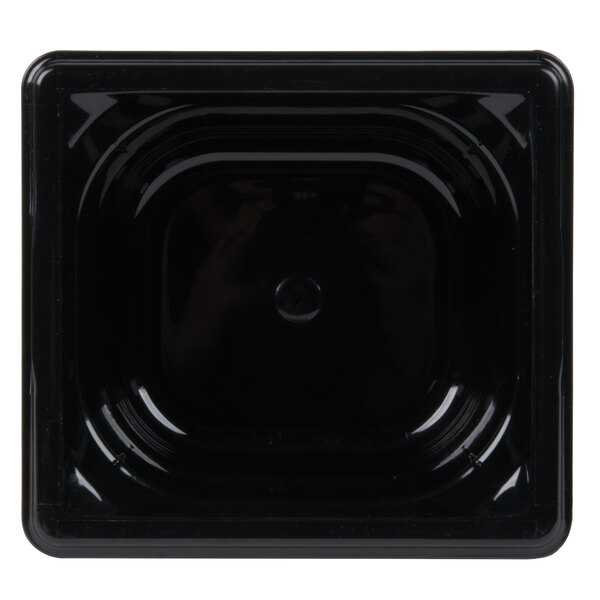 A black square Vollrath Super Pan with a white circle in the middle.