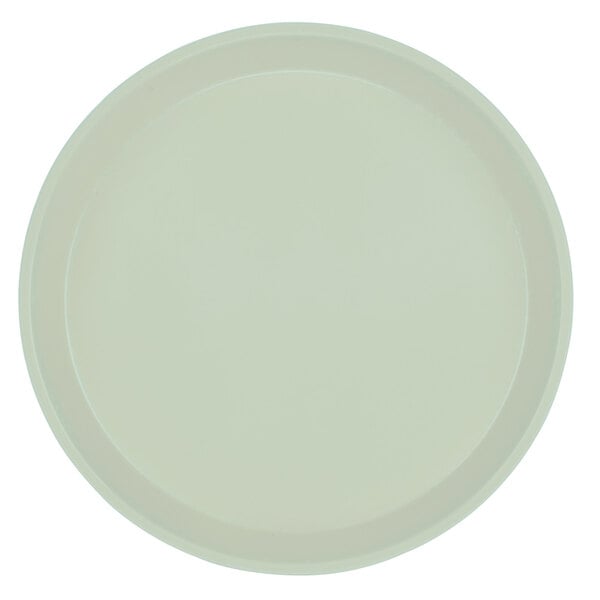 A white round Cambro Camtray with a round rim.