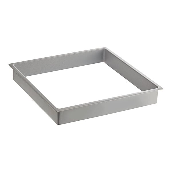 A gray square metal Assure collar on a white background.