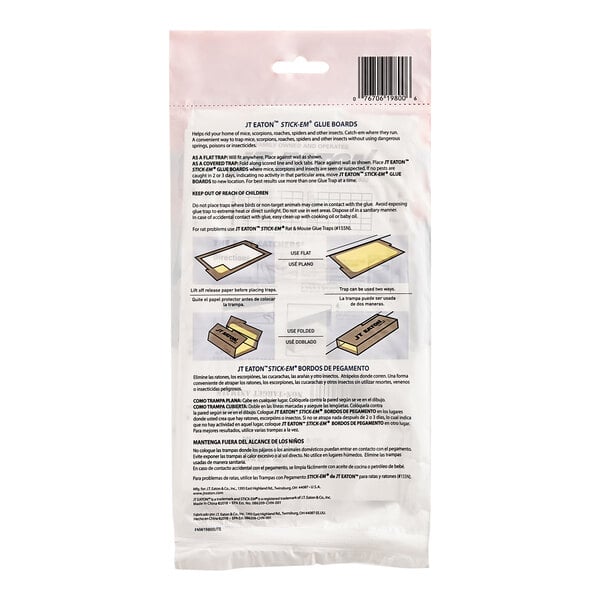 A white package of JT Eaton Stick-Em Mouse and Insect Glue Board Traps with instructions on a paper.