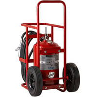 Front-facing red stored pressure fire extinguisher on hand truck with long hose