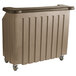 A brown and tan Cambro portable bar with wheels.