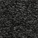 A close-up of a black Cactus Mat with rubber backing.