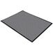 A grey rectangular carpet with a black border.