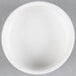 An American Metalcraft white porcelain salt and pepper dish on a grey surface.