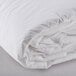 A close-up of a white Oxford 100% cotton hotel duvet insert.