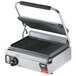 A Vollrath stainless steel panini grill with grooved top and bottom plates.