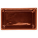 A Tablecraft copper rectangular server with ridges and a brown rim.