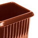 A brown rectangular Tablecraft pot with ridges on a counter.
