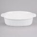 A white oval Tablecraft casserole dish with ridges and a lid.