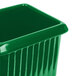 A Tablecraft green cast aluminum rectangle server with ridges.