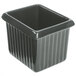 A gray rectangular cast aluminum server with ridges on a counter in a salad bar.