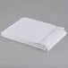 A folded white Oxford T200 Superblend XL flat sheet with stitched edges.