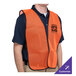 A man wearing a Cordova orange high visibility mesh safety vest with the logo of a company.