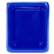 A cobalt blue rectangular cast aluminum server with ridges.