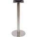 A BFM Seating stainless steel table base with black accents.