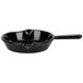 A Tablecraft black cast aluminum fry pan with a handle.