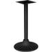 A BFM Seating black metal pedestal table base.