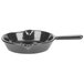 A black pan with a handle.