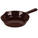 A brown Tablecraft cast aluminum fry pan with a handle.