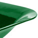 A Tablecraft green cast aluminum square bowl with curved edges.