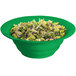 A Tablecraft green cast aluminum wide rim salad bowl filled with salad.