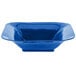 A cobalt blue square bowl with a white background.