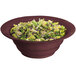 A Tablecraft maroon speckle salad bowl filled with salad and vegetables.