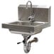 An Advance Tabco stainless steel hand sink with an electric faucet and lever-operated drain.