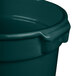 A dark green cast aluminum Bain Marie soup bowl with a lid.