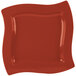 A square copper cast aluminum platter with a red wavy edge.