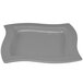 A Tablecraft granite cast aluminum rectangular platter with a wavy edge.