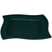 A hunter green rectangular platter with a wavy edge.