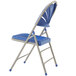 A gray National Public Seating metal folding chair with a blue plastic seat.